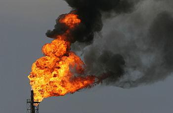 Flames rise in a burn-off of toxic gases at an oil refinery in Wilmington in 2005. 