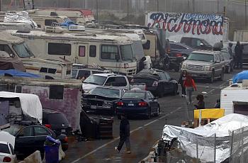 A vehicle encampment is photographed along Castro Street on Wednesday, Jan. 19, 2022, in Richmond, California. The city has appl