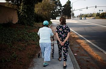SANTA CLARA, CALIFORNIA – August 12: Ana Nicho Luu, 66, right, takes her mother, Maura Nicho, 90, who has Alzheimer’s disease, f
