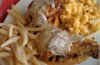 "Fried chicken and waffles" by Salim Virji is licensed under CC BY-SA 2.0 Fried chicken