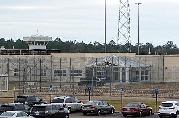 Civil rights groups sue state to protect inmates from deadly virus