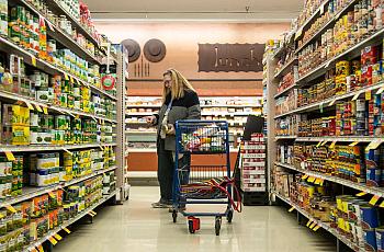 Michele Dutcher takes a bus to and from the Valumarket at the Mid City Mall on Bardstown Road a few times a week for groceries. 