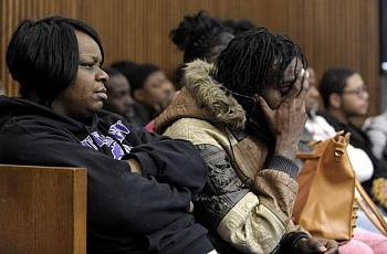 Lyvonne Cargill, left, listens with family members and friends on Thursday at the trial of Chauncey Owens and Charles Jones, who are accused of killing 17-year-old Je'Rean Blake Nobles. (Todd McInturf / The Detroit News)