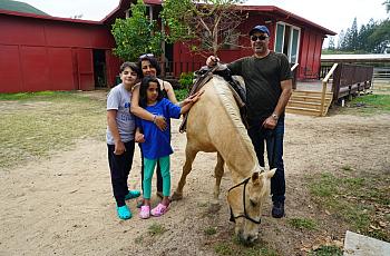 Lilian Ansari of Oakland with her husband Saied, daughter Atrina, 11, and son Ardalon, 15, on vacation before the pandemic. Life