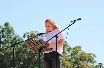 Abbi Berry, who graduated from Los Gatos High School in 2018, speaks during a rally over sexual abuse on campus. 