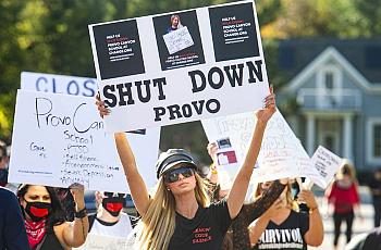 Paris Hilton leads a march to the Provo Canyon School, during a rally calling for the closure of Provo Canyon School, a resident