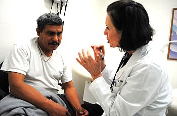 Jose Diaz Garcia receiving treatment at Lestonnac Free Clinic. 