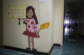 A hand painted sign in the hallway of the International Student Admissions and Enrollment office in Prince Georges County.