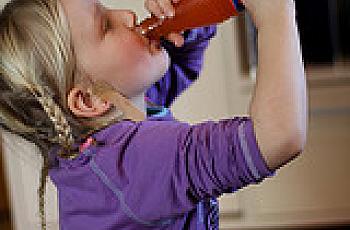 Kid drinking soda