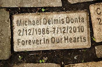 The name of Mike Donta's son, Michael Delmis Donta, is engraved on one of the bricks at the children's memorial.