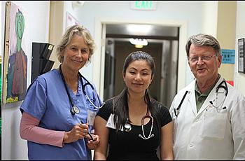 Kate Ratcliff and Amy Chao volunteer as nurses at RotaCare Richmond Free Medical Clinic at Brighter Beginnings. Dr. Pate Thomson, right, is the medical director in charge of adult care and a retired cardiologist. Photo by Momo Chang