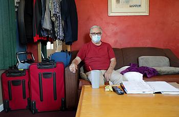 Lee Fournier sits in his hotel room provided by Project Roomkey on Sunday, October 11, 2020, at Rodeway Inn & Suites in Indio, C