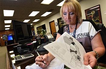 Kayla Wilson, who teaches sex education courses throughout Fresno County, at work in her office at the Fresno County Office.
