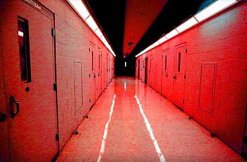In this photo illustration, a hallway of cells is shown at the Palm Beach Youth Academy in West Palm Beach. Emily Michot 