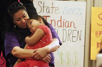 Madonna Pappan and her child in 2013. Pappan was is one of three Sioux mothers who sued South Dakota over its alleged violation 
