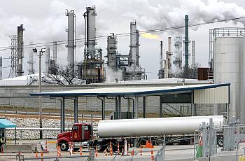 Tanker trucks refill at the Valero Refinery facility at Rivergate Industrial Port in south Memphis. 