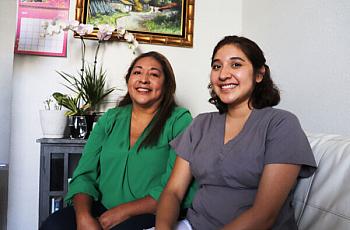 Ivonne Estela Ramos and her daughter Allison, pose for a portrait inside their studio in San Francisco's Bayview neighborhood. 
