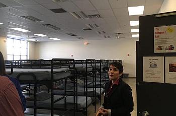 Amina Aun, shelter manager at Roy's Desert Resource Center, offers a tour of the shelter.