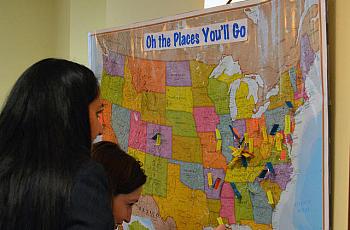 Medical students in Louisville put their names on a U.S. map showing where they’re headed for the residencies.
