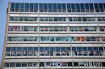 Hahnemann Hospital windows are decorated by employees as the hospital prepares to close. 