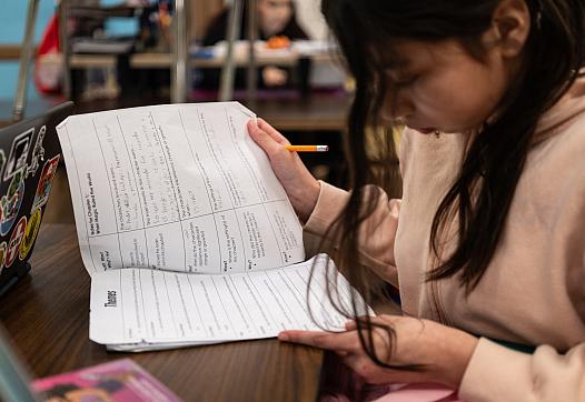 girl reading document