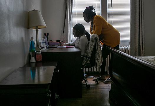 Two women at their home working