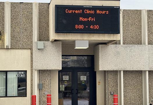 Entrance to a clinic with a sign