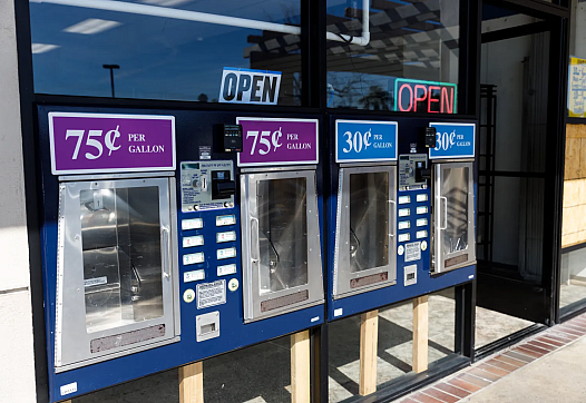 Machines with prices displayed above them