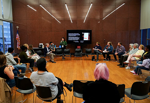 Group of people seated in a circle