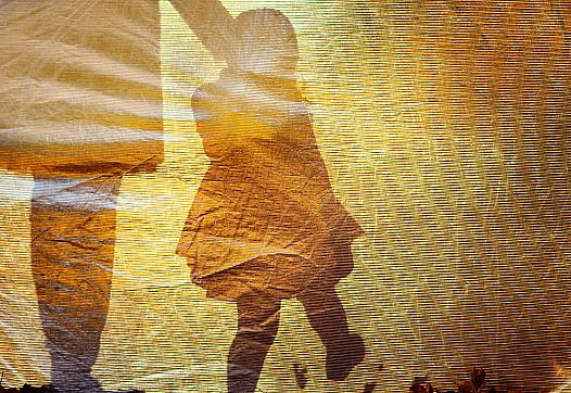 A child and most likely a parent