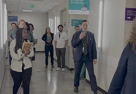 Journalists tour a medical facility in LA.