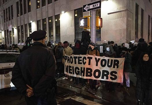 People holding a sign