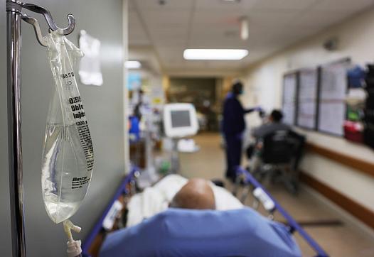 IV bag with hospital background