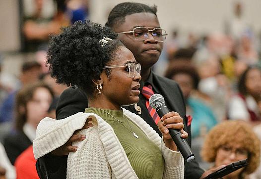 Students speak in opposition to a proposal by Elon Musk's xAI to run gas turbines at a new data center in Memphis, Tennessee, during a public comment meeting.