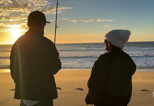 Two people by seaside