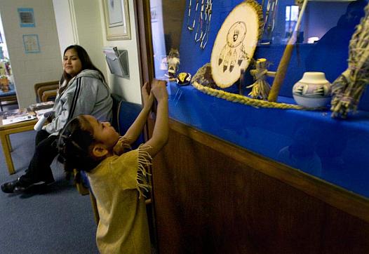 Child looking up at souvenir