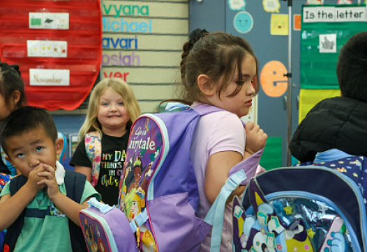 Children waiting to be picked up at a school