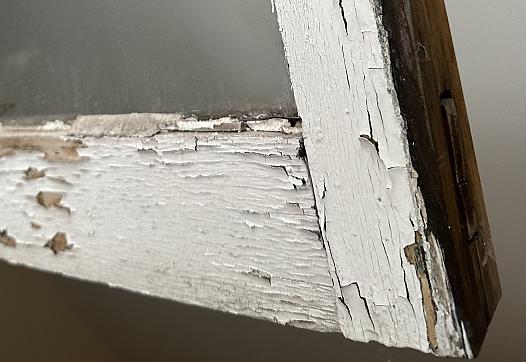 Peeling paint on window