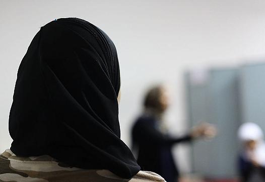 Back image of a person wearing burkha