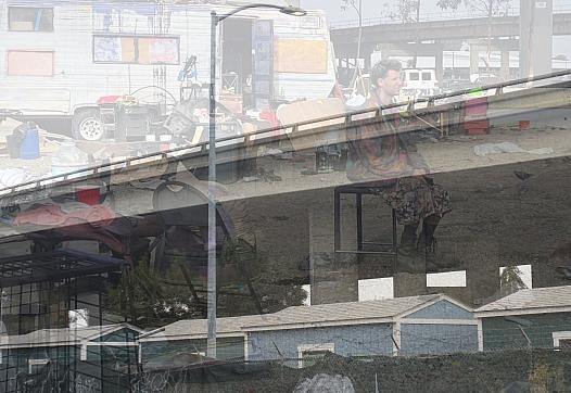 Image of a homeless man overlayed on an image of a freeway