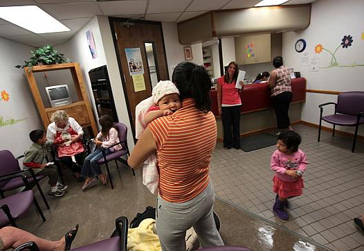 Room full of people and babies