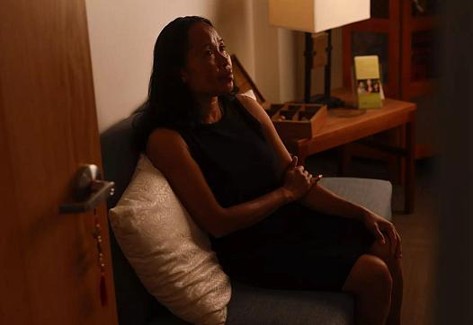 A person sitting on a couch 