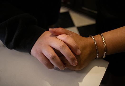 2 hands intertwined