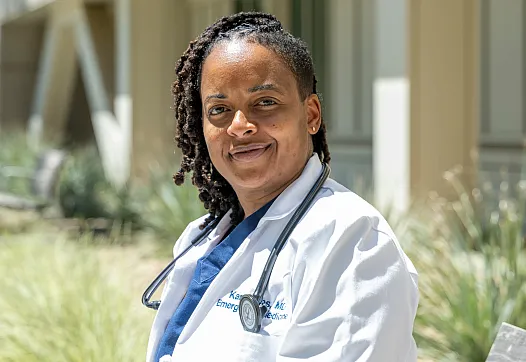 A women wearing white coat