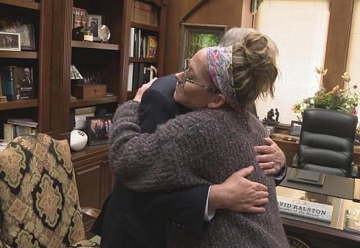 Christina Henry embraces Georgia House Speaker David Ralston after the passage of the state's mental health reform bill in March 2022.