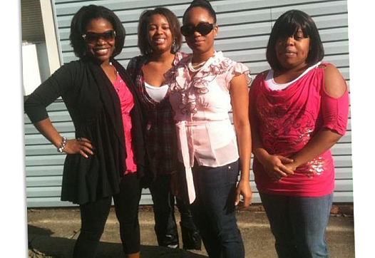 4 people standing together