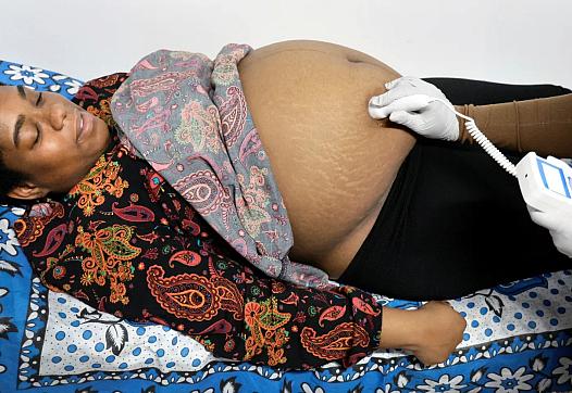 Pregnant person getting medical care