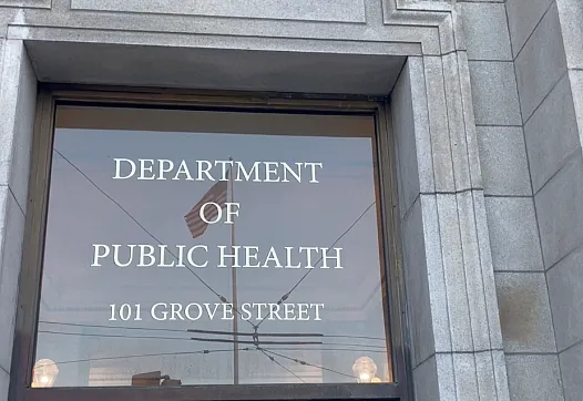 A window with text, department of piblic health 101 grove street