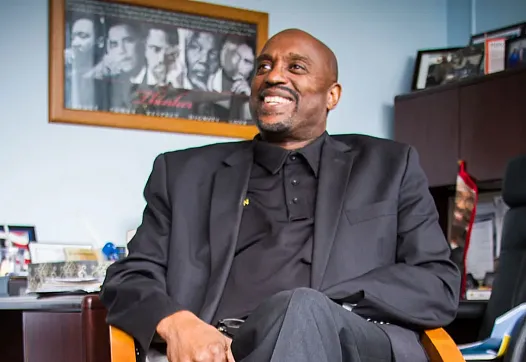 A person in a black suit