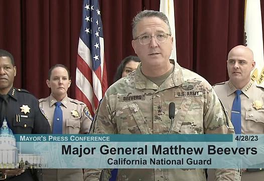 Army General speaking at Mayor's press conference